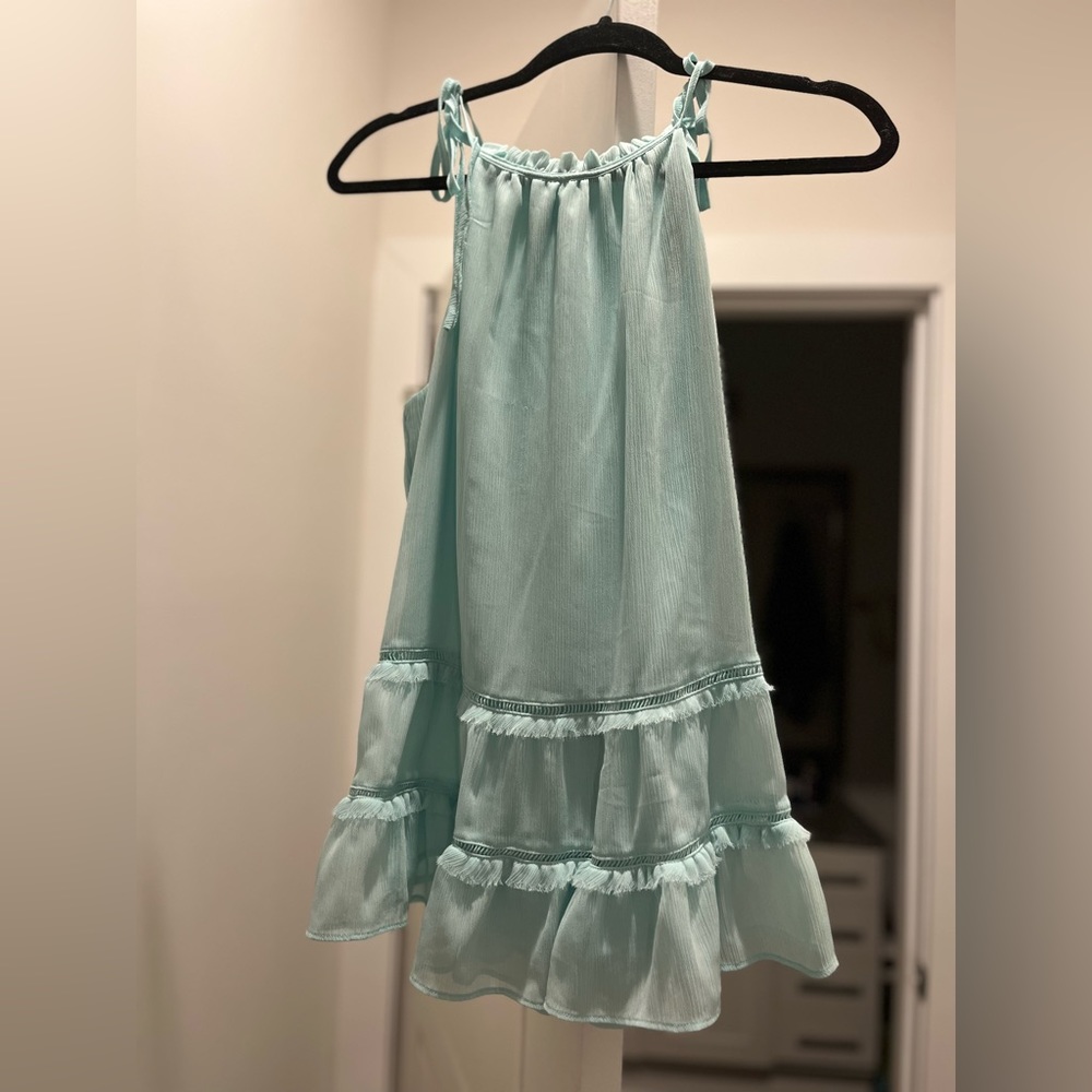 Size Medium. Blue tank top. Only worn twice.